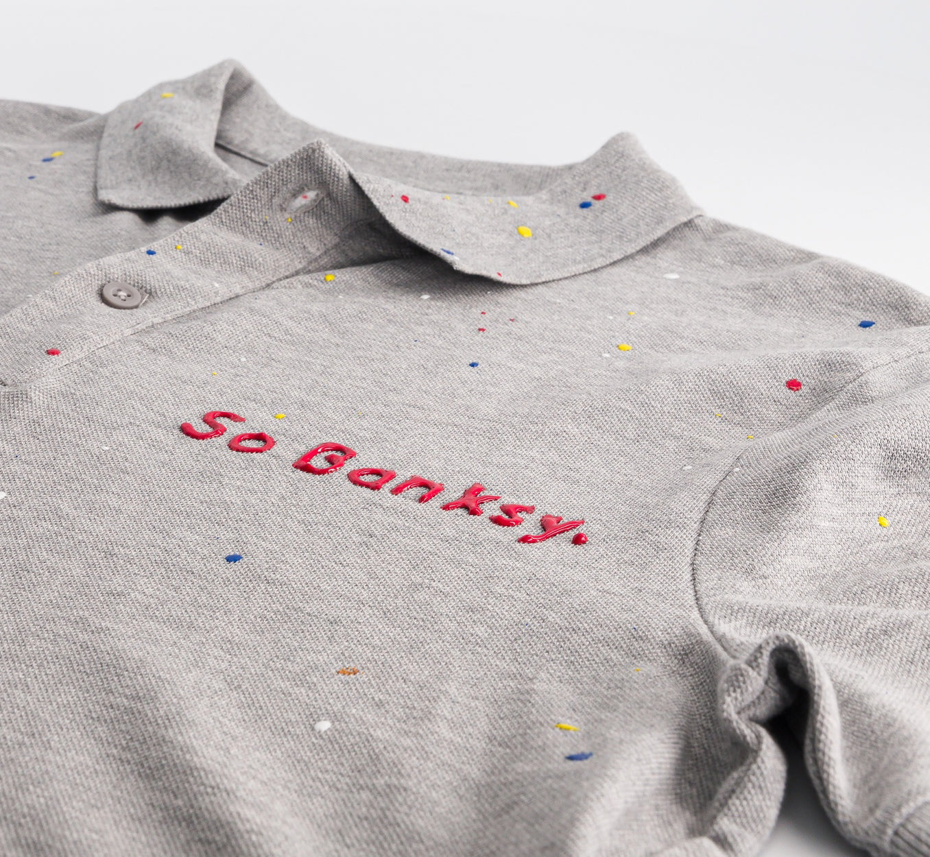 Polo gris chiné en maille piquée - So Banksy