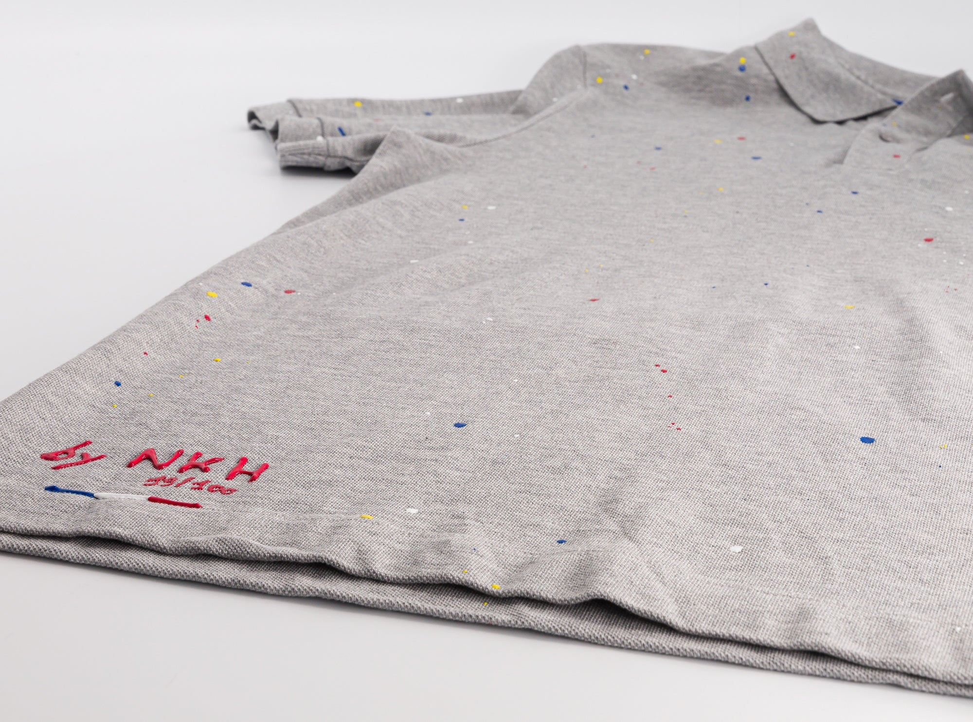 Polo gris chiné en maille piquée - So Banksy